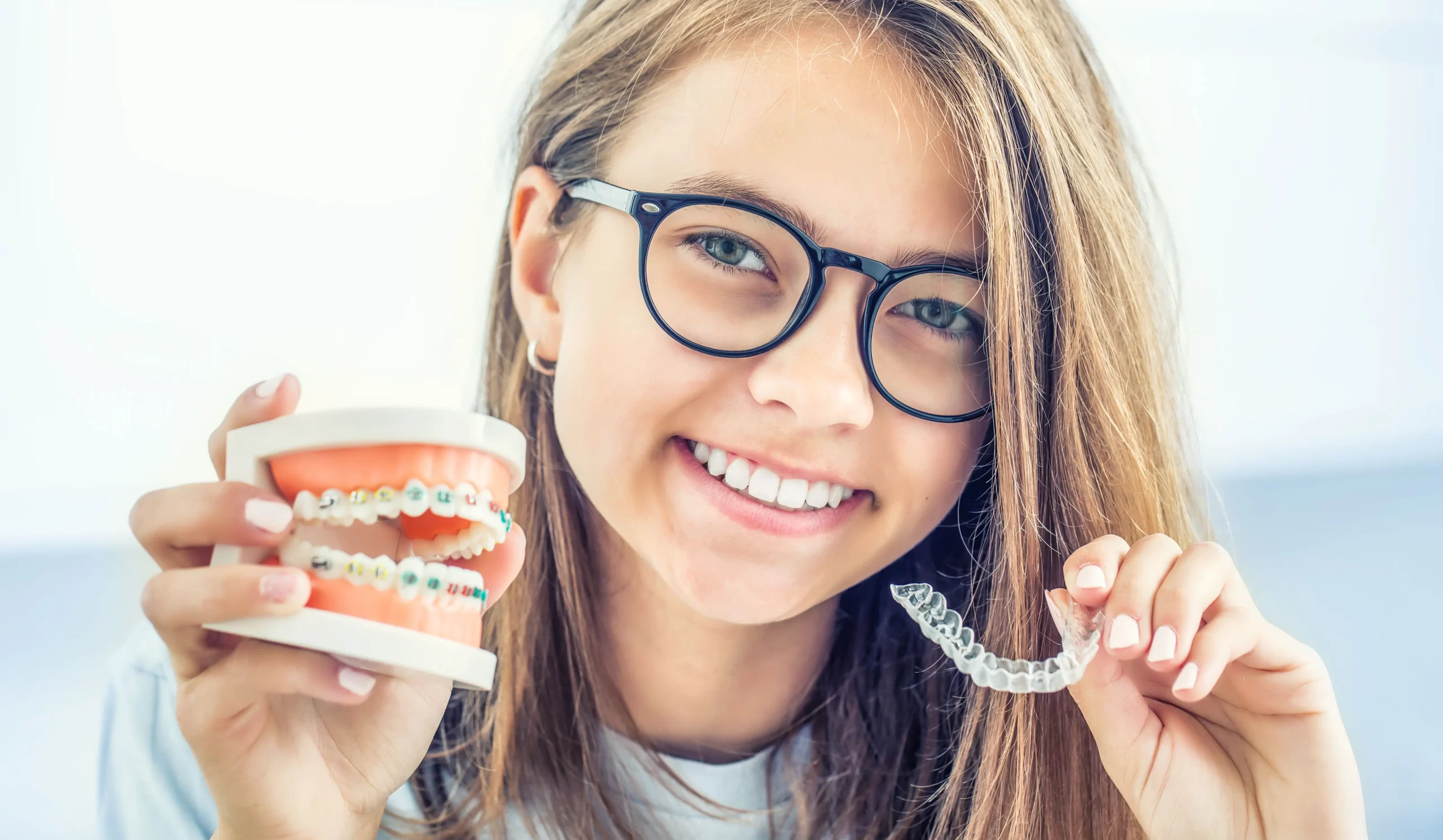 How to Choose Between Invisalign and Metal Braces - Marian Orthodontics